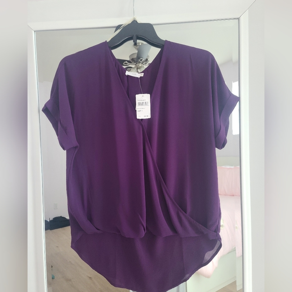 LUSH size large eggplant(purple) short sleeve NWT blouse. Super pretty.
